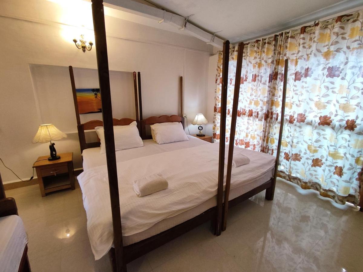 Maria Paulo Guest House Bar And Restaurant 아곤다 외부 사진